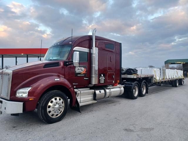 Kenworth T880 with a loaded flatbed